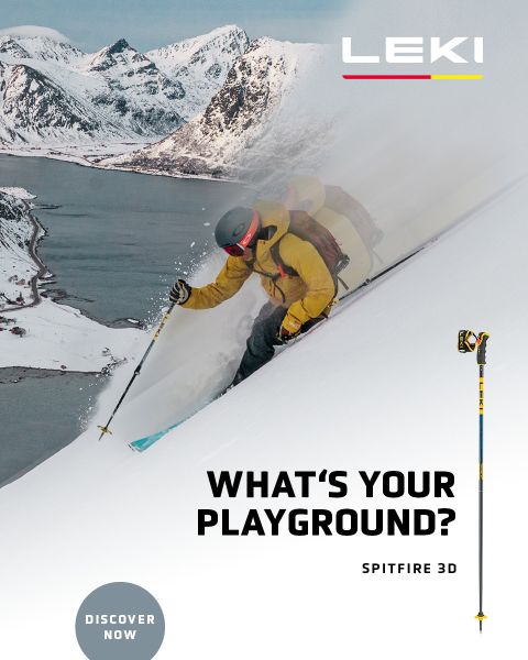 Un skieur en veste jaune et lunettes de ski descend une pente de montagne enneigée avec des bâtons. En arrière-plan, on aperçoit des montagnes enneigées et un lac. Le texte est « QUEL EST TON TERRAIN DE JEU ? SPITFIRE 3D » avec un bouton « DÉCOUVRIR MAINTENANT ».