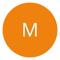 Un cercle orange avec une lettre « M » blanche au centre.
