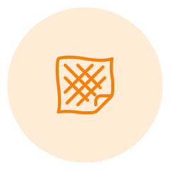 Symbole d'un tissu à carreaux avec un coin plié, représenté en orange sur un fond circulaire beige clair.
