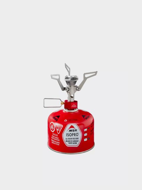 Réchaud à gaz portable avec un boîtier orange et l'inscription « Primus Lite+ » sur une cartouche de combustible rouge. En haut, sur un fond gris clair, figure le texte « RÉCHAUD & ACCESSOIRES ».