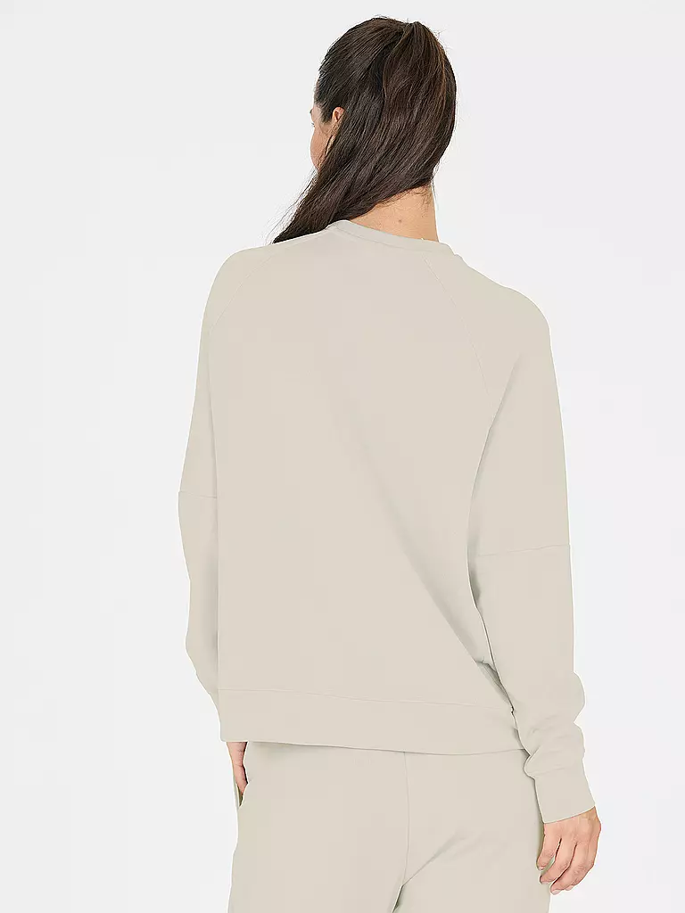 ATHLECIA | Sweat-shirt de sport pour femmes Jacey à col rond | Beige