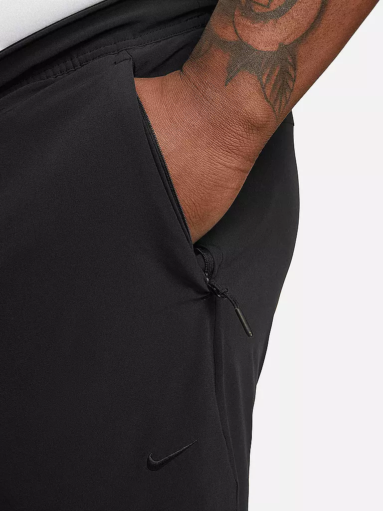 NIKE | Pantalon de fitness Unlimited pour homme |
