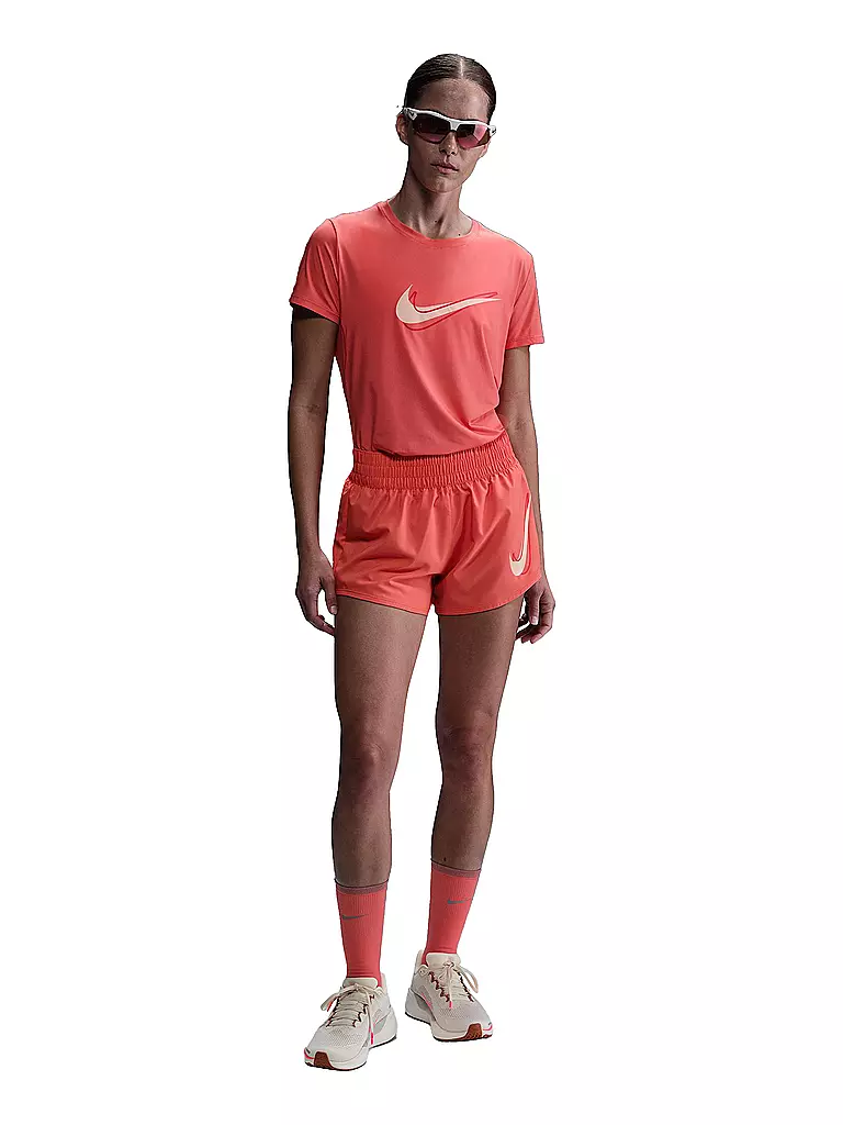 NIKE | Short de course One Swoosh pour femme | Corail
