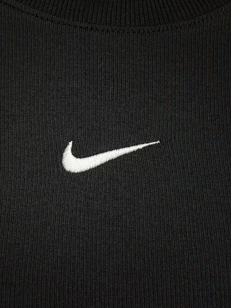 NIKE | Top court de sport Chill Knit pour femme |