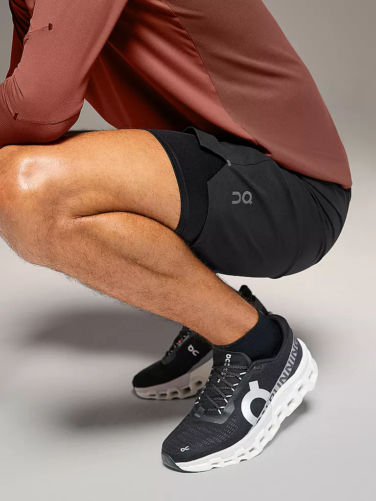 ON | Short de course 2en1 Performance Hybrid pour homme |