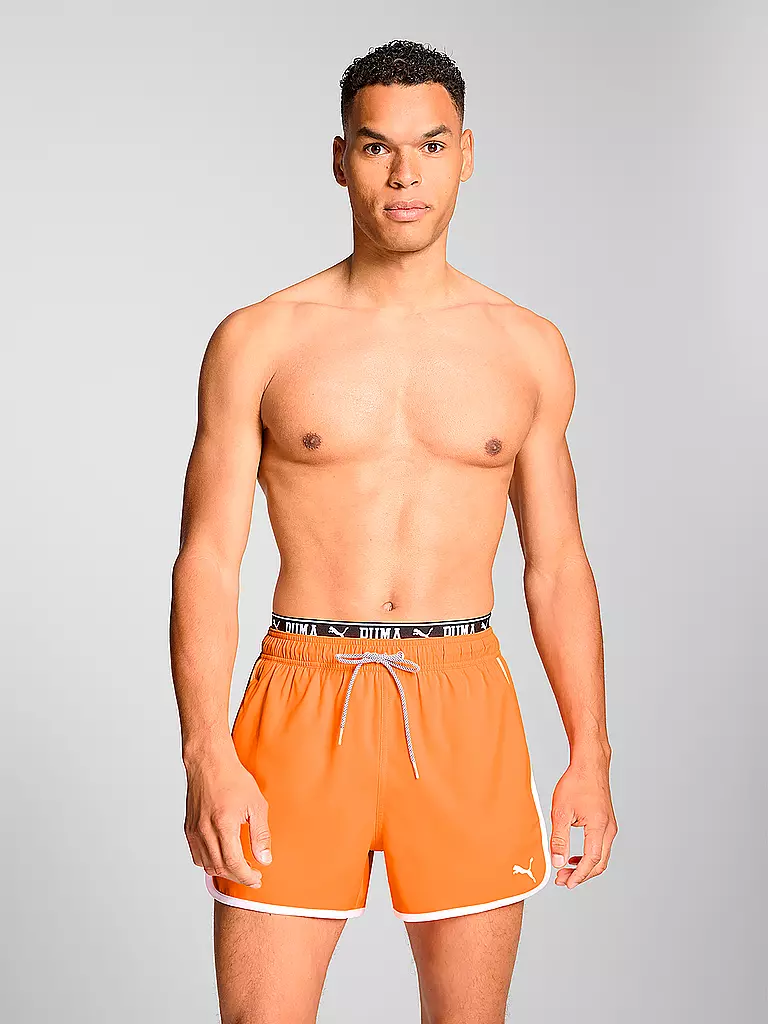 PUMA | Short de bain Track pour hommes | Orange